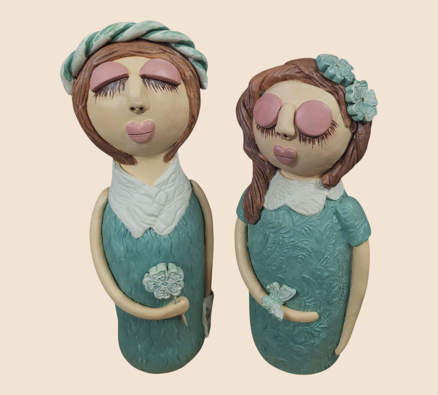 Handcrafted Clay Figurine Set 'Serene Sisters'