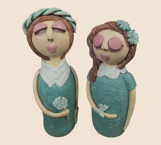 Handcrafted Clay Figurine Set 'Serene Sisters'